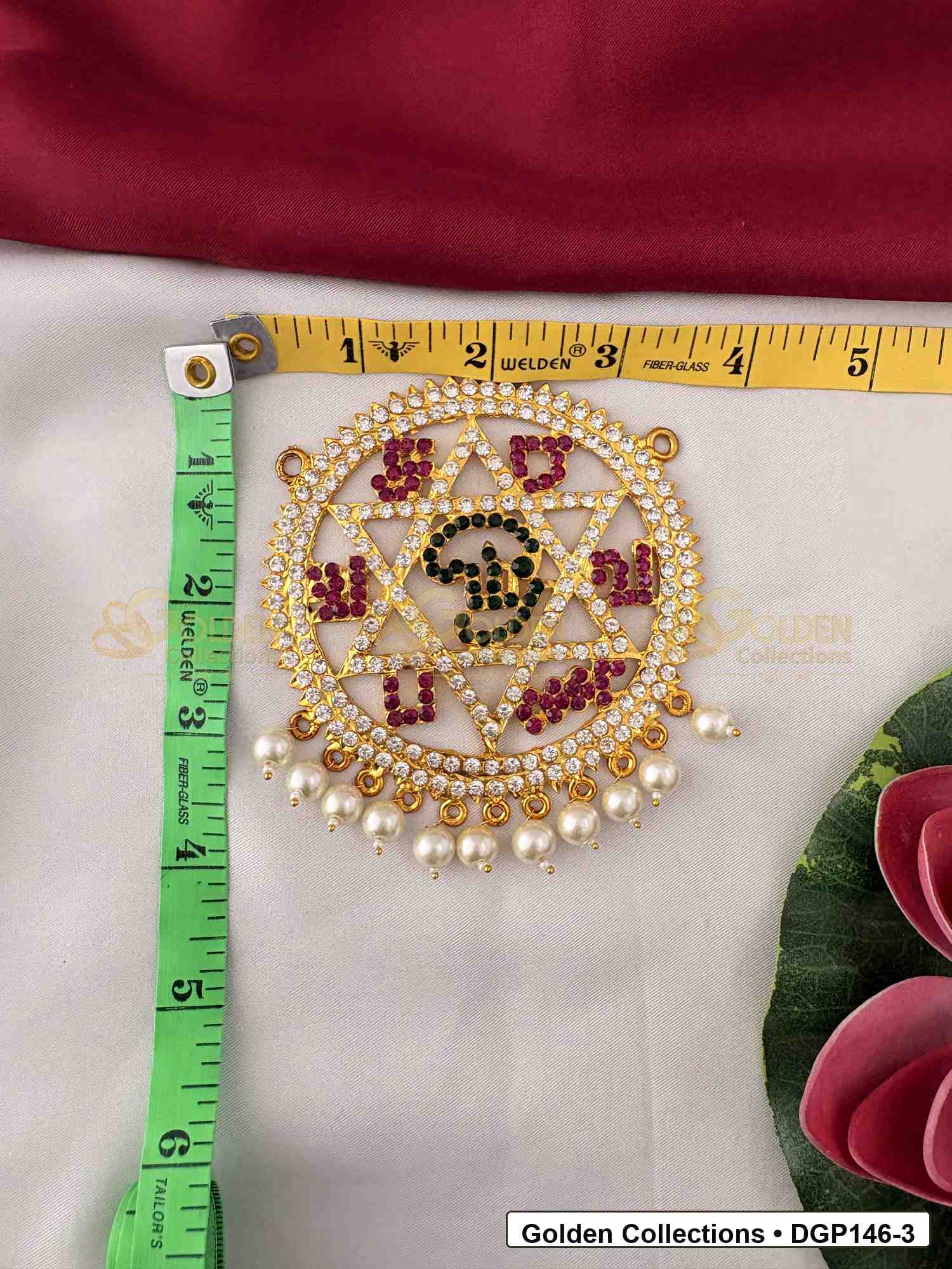 Measurement photo showing 4 x 3.5 Inches om motif round deity pendant for idol alankaram with ruler for idol alankaram