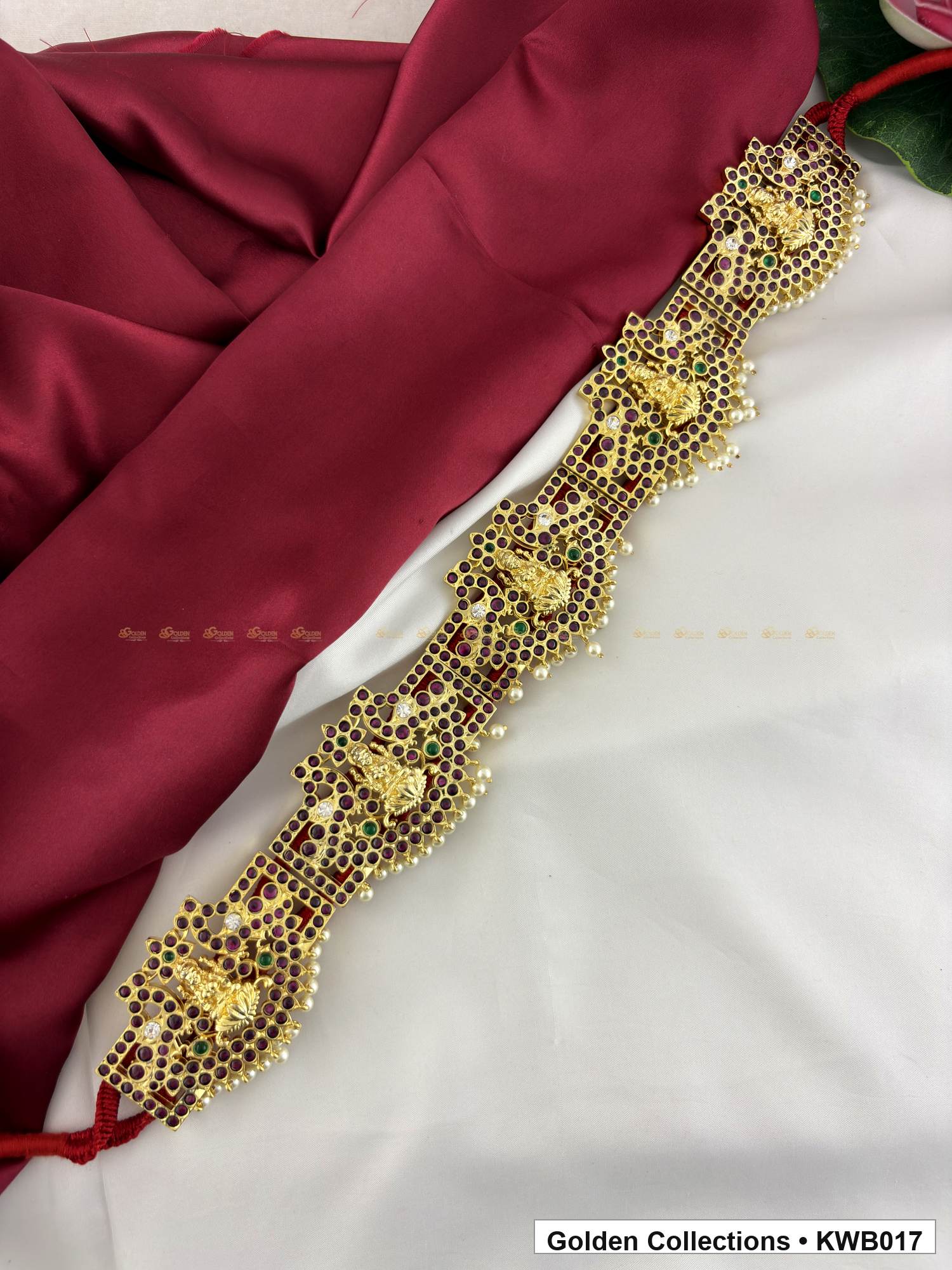 Angled product view of Oval Link Real Kemp Vaddanam Waist Belt from Golden Collections