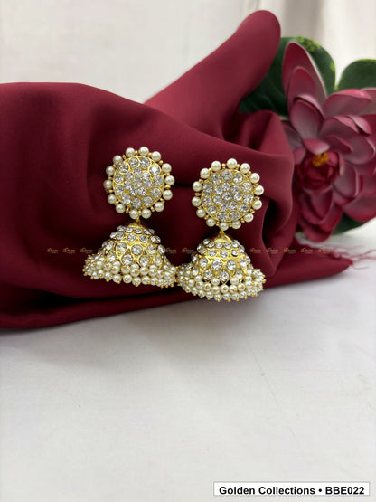 Front view of Pearl Cluster Real Kemp Dome Jhumki Earrings from Golden Collections