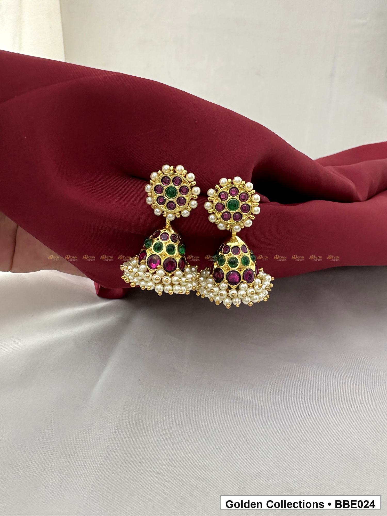 Angled product view of Pearl Drop Real Kemp Jhumki Earrings from Golden Collections