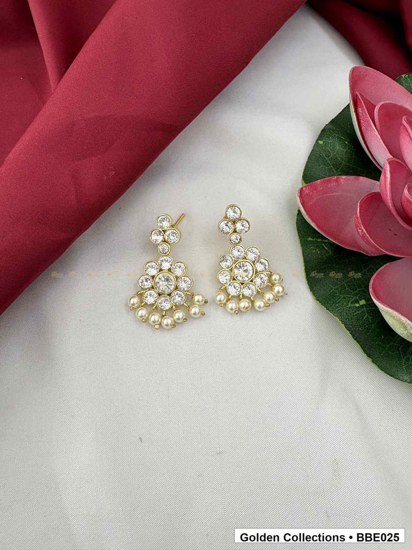 Angled product view of Pearl Floral Real Kemp Long Jhumki Earrings from Golden Collections