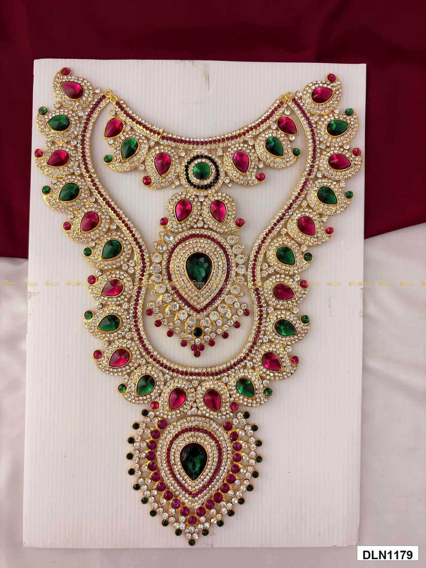 Front view of deity chest long haram with multicolor stones and gold plating for idol alankaram