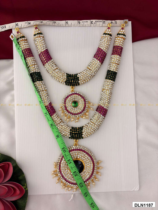 Measurement photo of deity long haram set with measuring tape for idol alankaram size reference