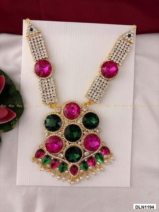 Front view of deity long haram with multicolor stones and gold plating for idol alankaram