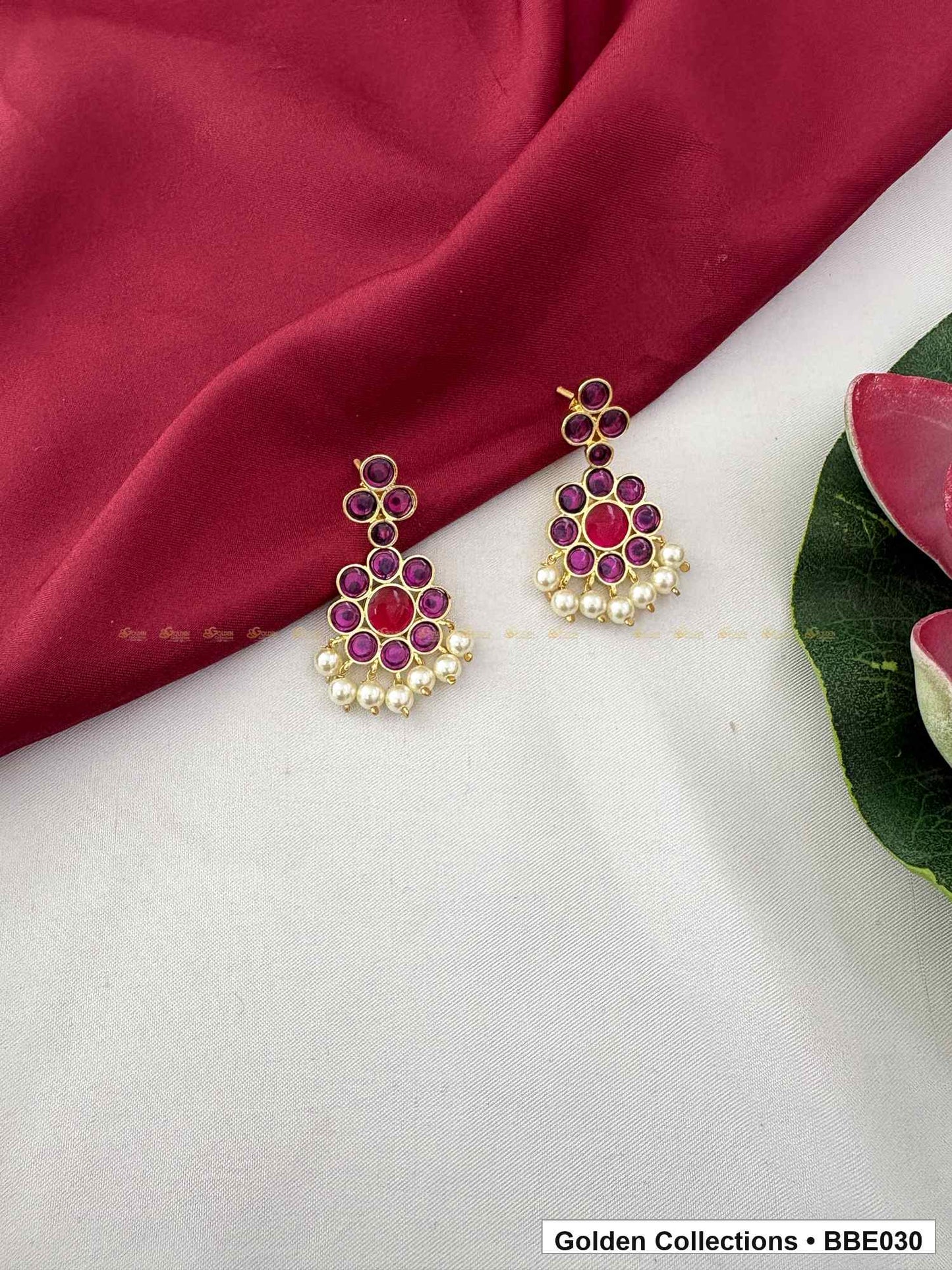 Front view of Pink Stone Pearl Real Kemp Jhumki Earrings from Golden Collections