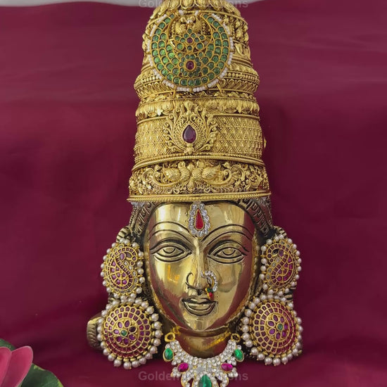 Fully decorated brass Varalakshmi face with green teardrop AD necklace shown in product video