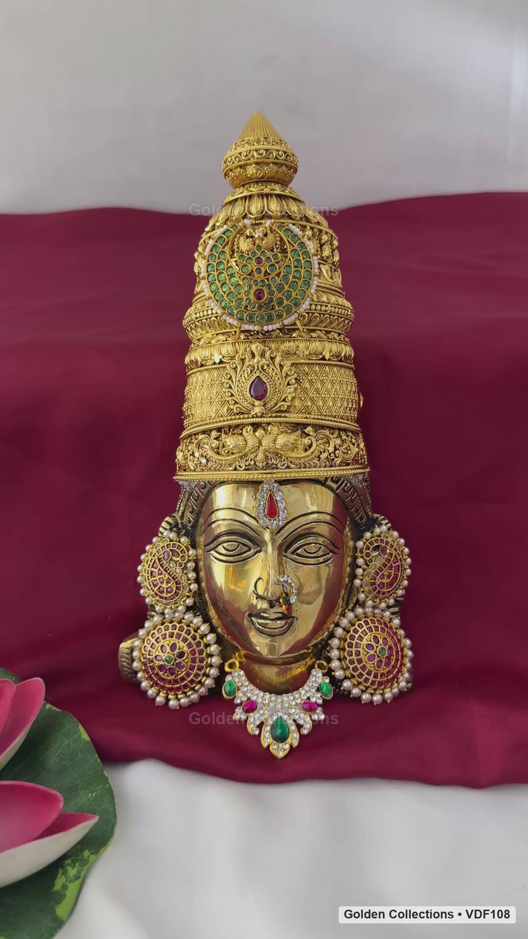 Fully decorated brass Varalakshmi face with green teardrop AD necklace shown in product video
