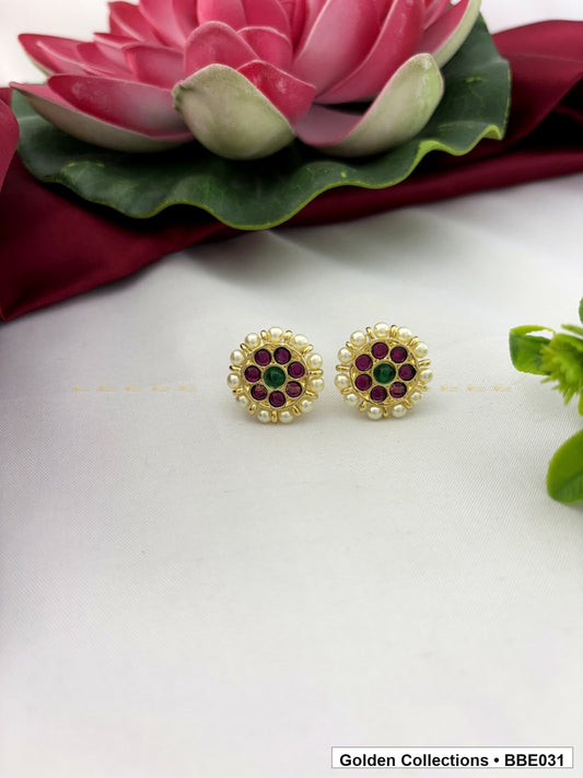 front product view of Real kemp stud earrings with red and green stones from Golden Collections