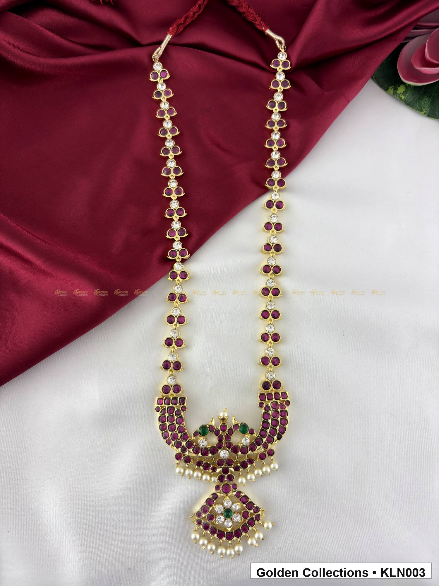 Angled product view of Red Green Stone Real Kemp Long Haram with Pendant from Golden Collections