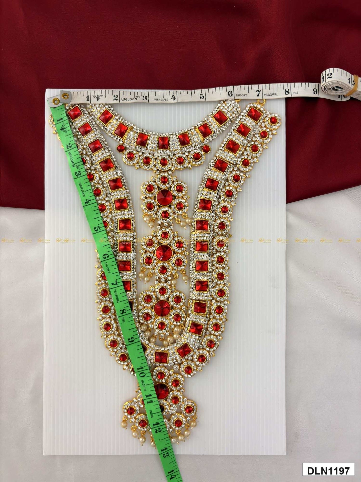 Measurement photo of deity chest long haram with measuring tape for idol alankaram size reference