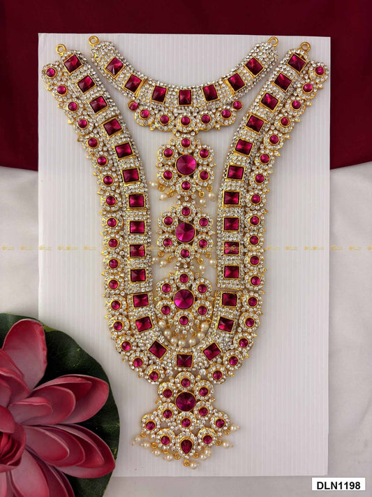 Front view of deity chest long haram with multicolor stones and gold plating for idol alankaram
