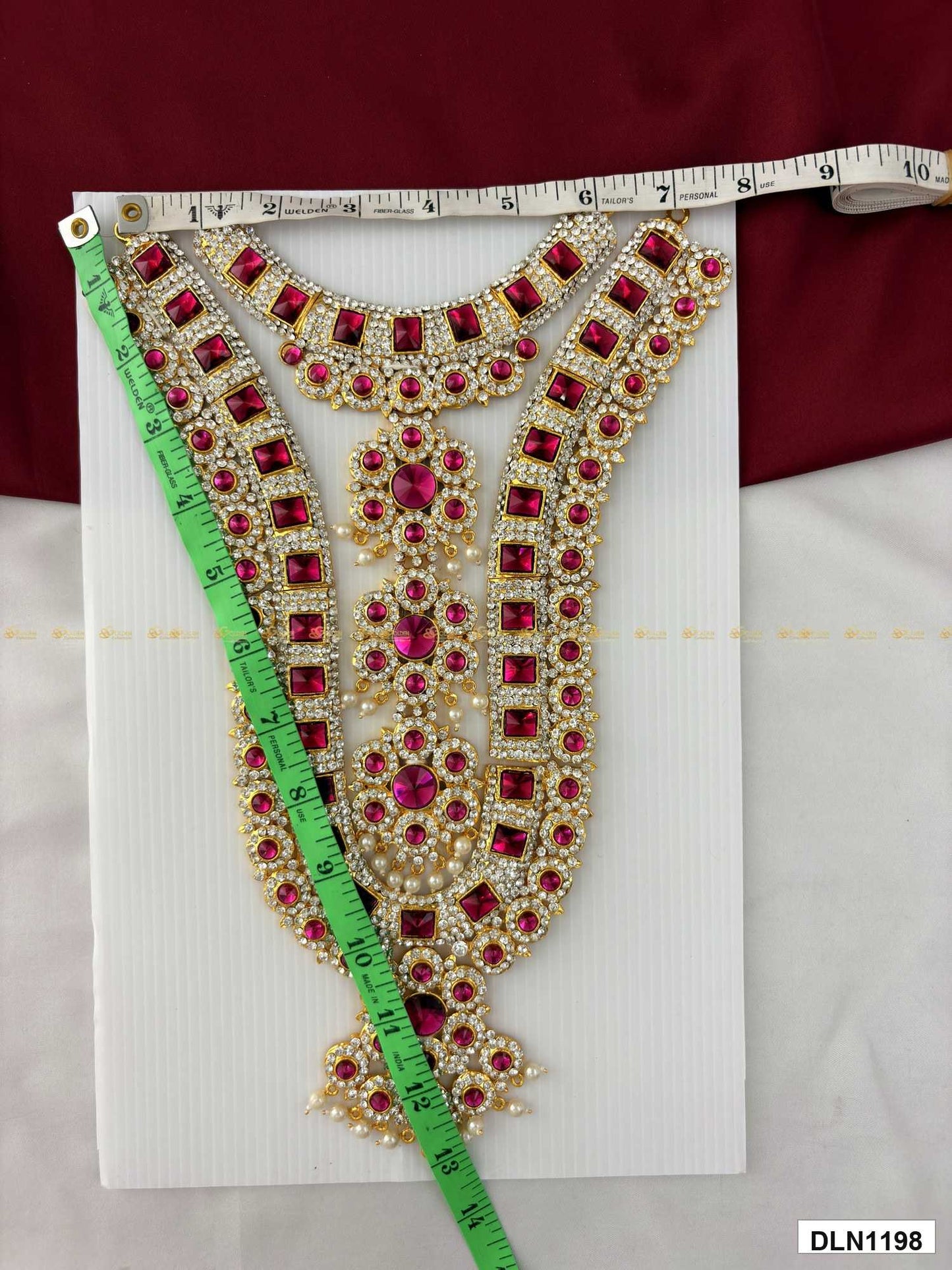 Measurement photo of deity chest long haram with measuring tape for idol alankaram size reference