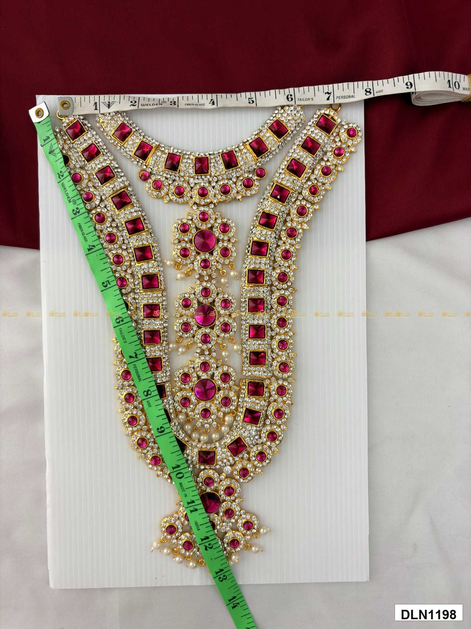 Measurement photo of deity chest long haram with measuring tape for idol alankaram size reference