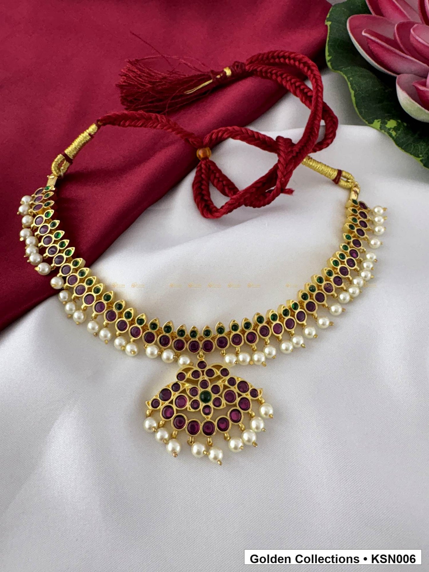 Angled product view of Red Stone Real Kemp Crescent Necklace with Pearl Border from Golden Collections