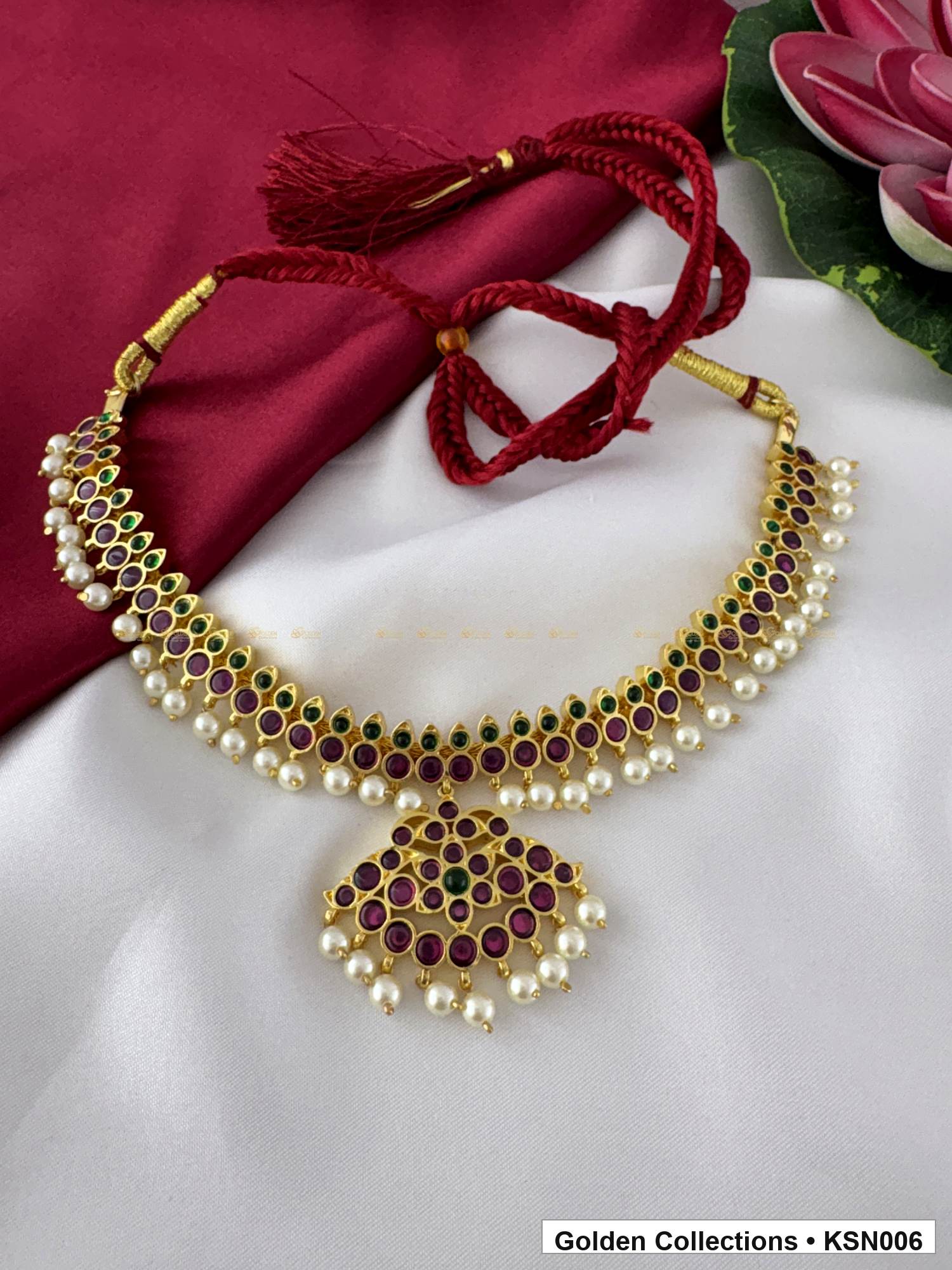 Angled product view of Red Stone Real Kemp Crescent Necklace with Pearl Border from Golden Collections