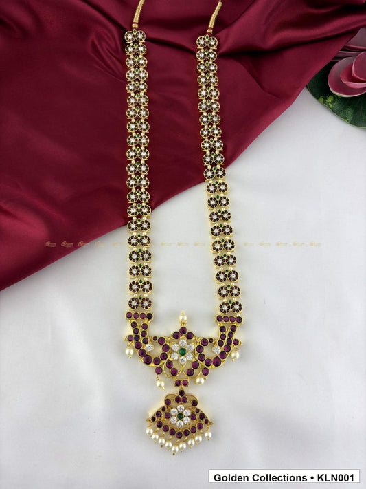 Front view of Red Stone Real Kemp Long Haram with Temple Pendant from Golden Collections