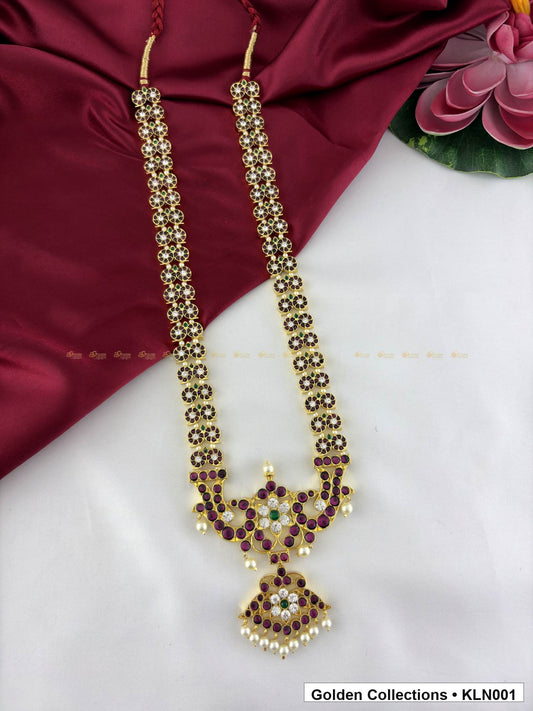 Angled product view of Red Stone Real Kemp Long Haram with Temple Pendant from Golden Collections