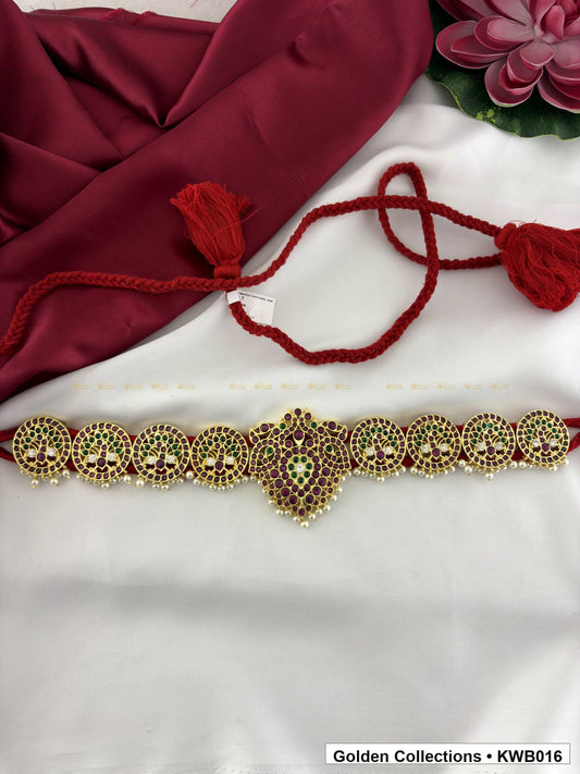 Front view of Red Stone Real Kemp Vaddanam Waist Belt with Center Pendant from Golden Collections