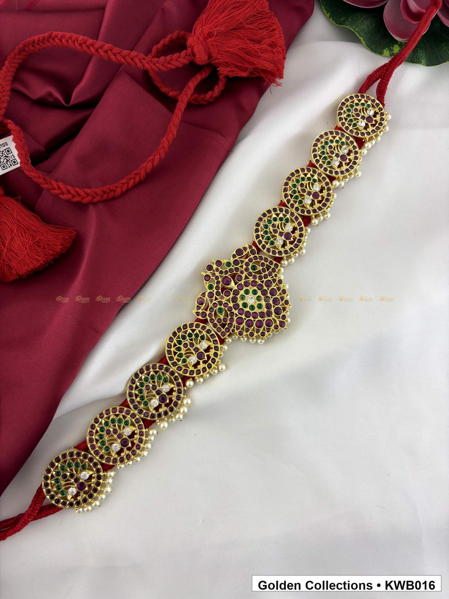Detail view of Red Stone Real Kemp Vaddanam Waist Belt with Center Pendant from Golden Collections