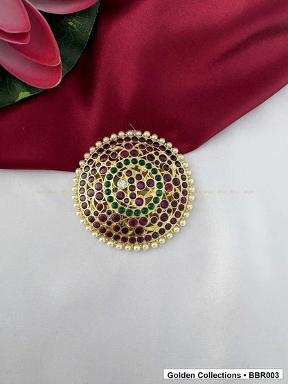 Angled product view of Round Real Kemp Rakodi with Red and Green Stones from Golden Collections