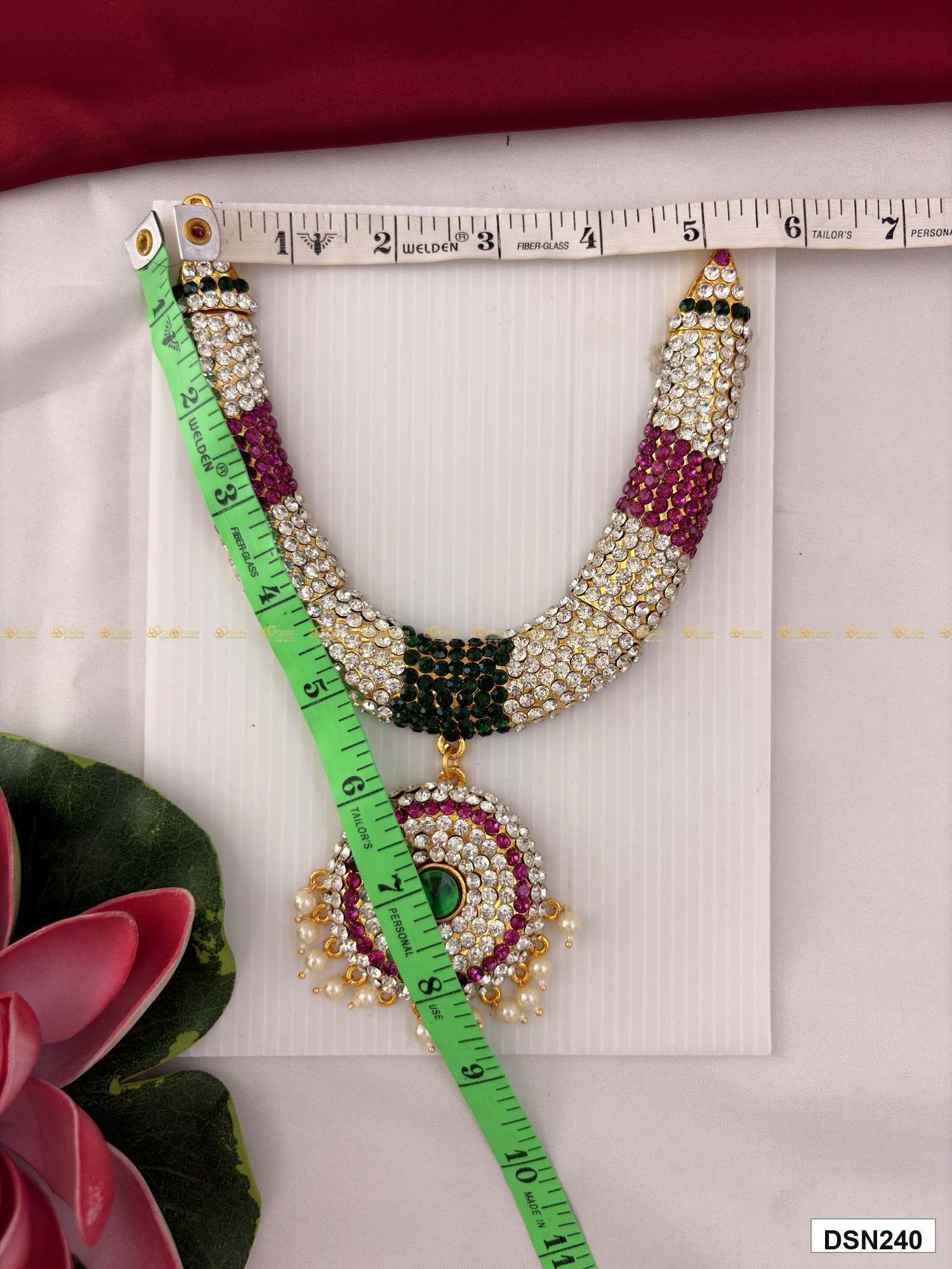 Measurement photo of deity short haram with measuring tape for idol alankaram size reference