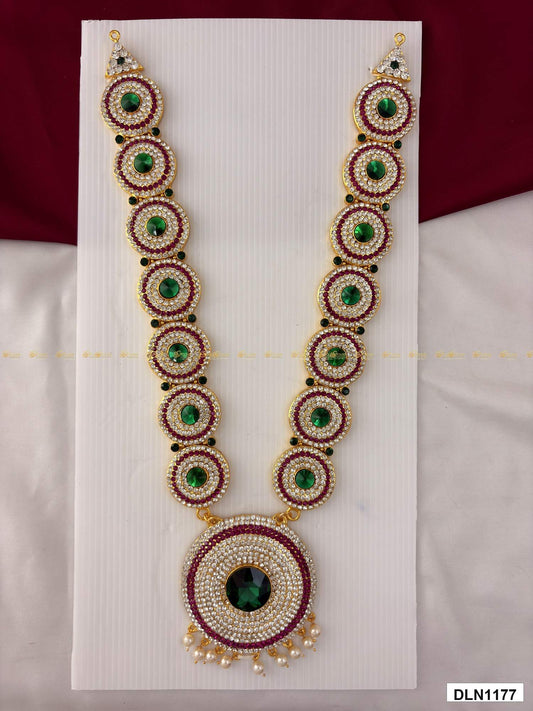 Front view of deity long haram with multicolor stones and gold plating for idol alankaram
