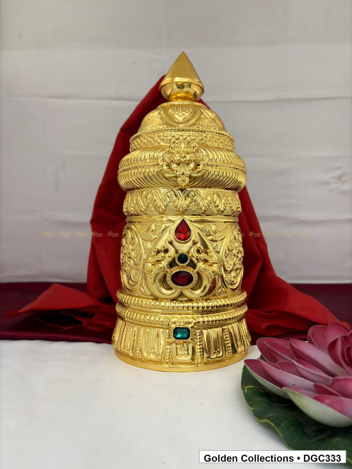 Front view of scroll medallion full-round brass deity crown with red green accents, measured size 13 X 16.5 X 5