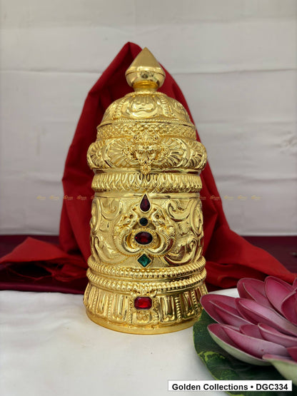 Front view of scroll medallion full-round brass deity crown with red green accents, measured size 11 X 15.5 X 4.5
