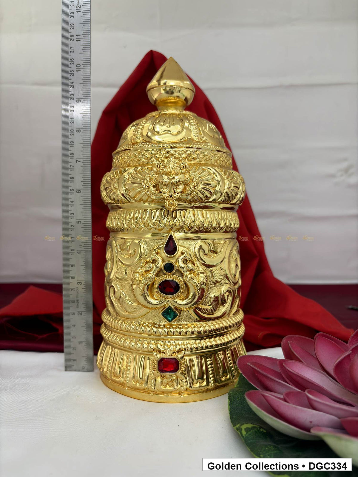 Height measurement view of scroll medallion full-round brass deity crown with red green accents, measured size 11 X 15.5 X 4.5