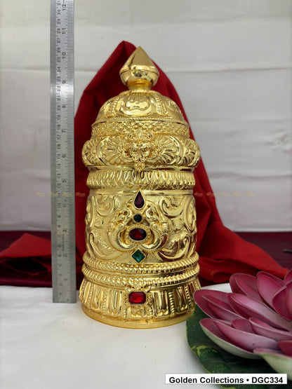Height measurement view of scroll medallion full-round brass deity crown with red green accents, measured size 11 X 15.5 X 4.5