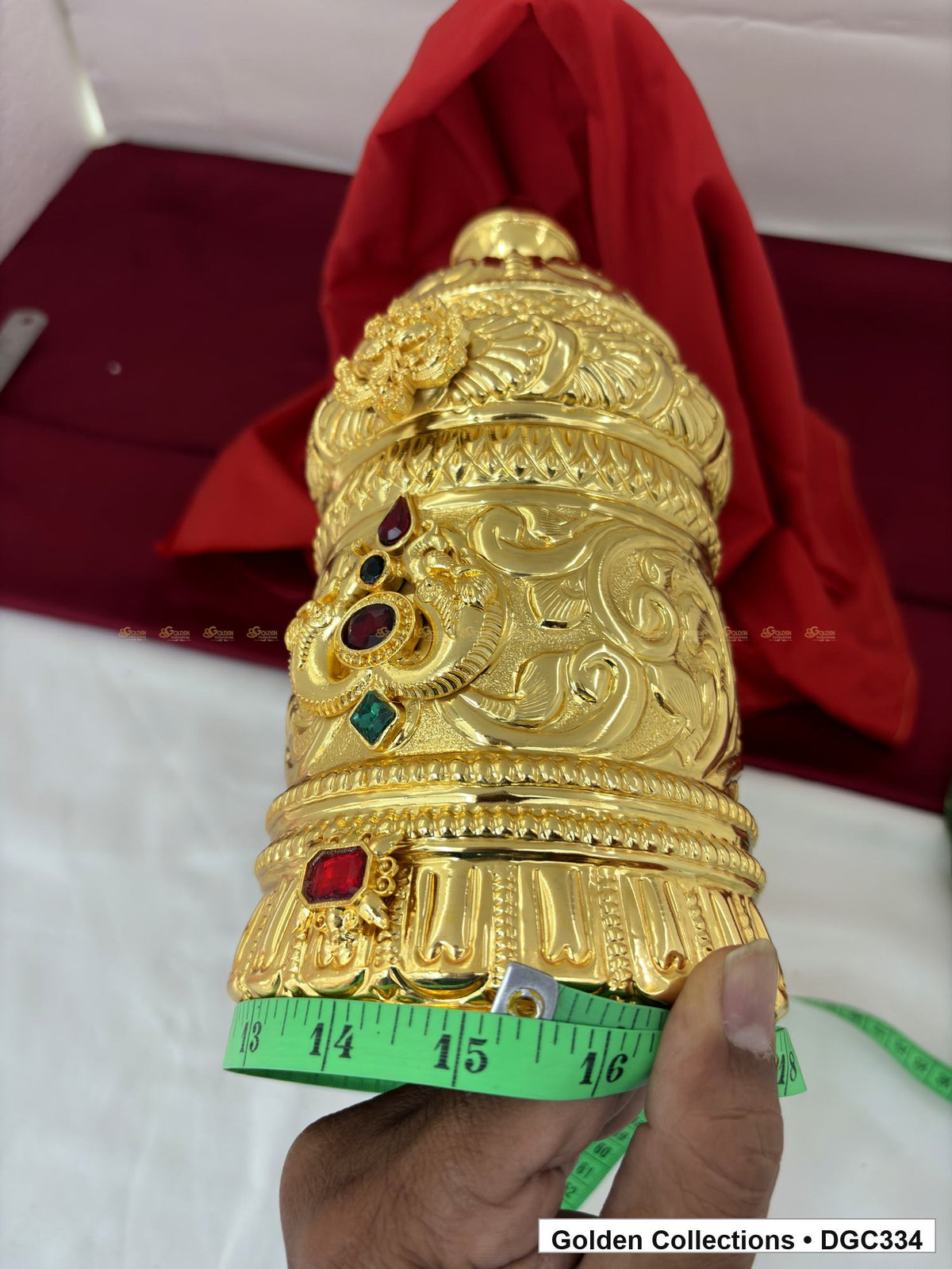 Side and base measurement view of scroll medallion full-round brass deity crown with red green accents, measured size 11 X 15.5 X 4.5