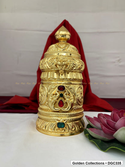 Front view of scroll medallion full-round brass deity crown with red green accents, measured size 9.5 X 13.5 X 4