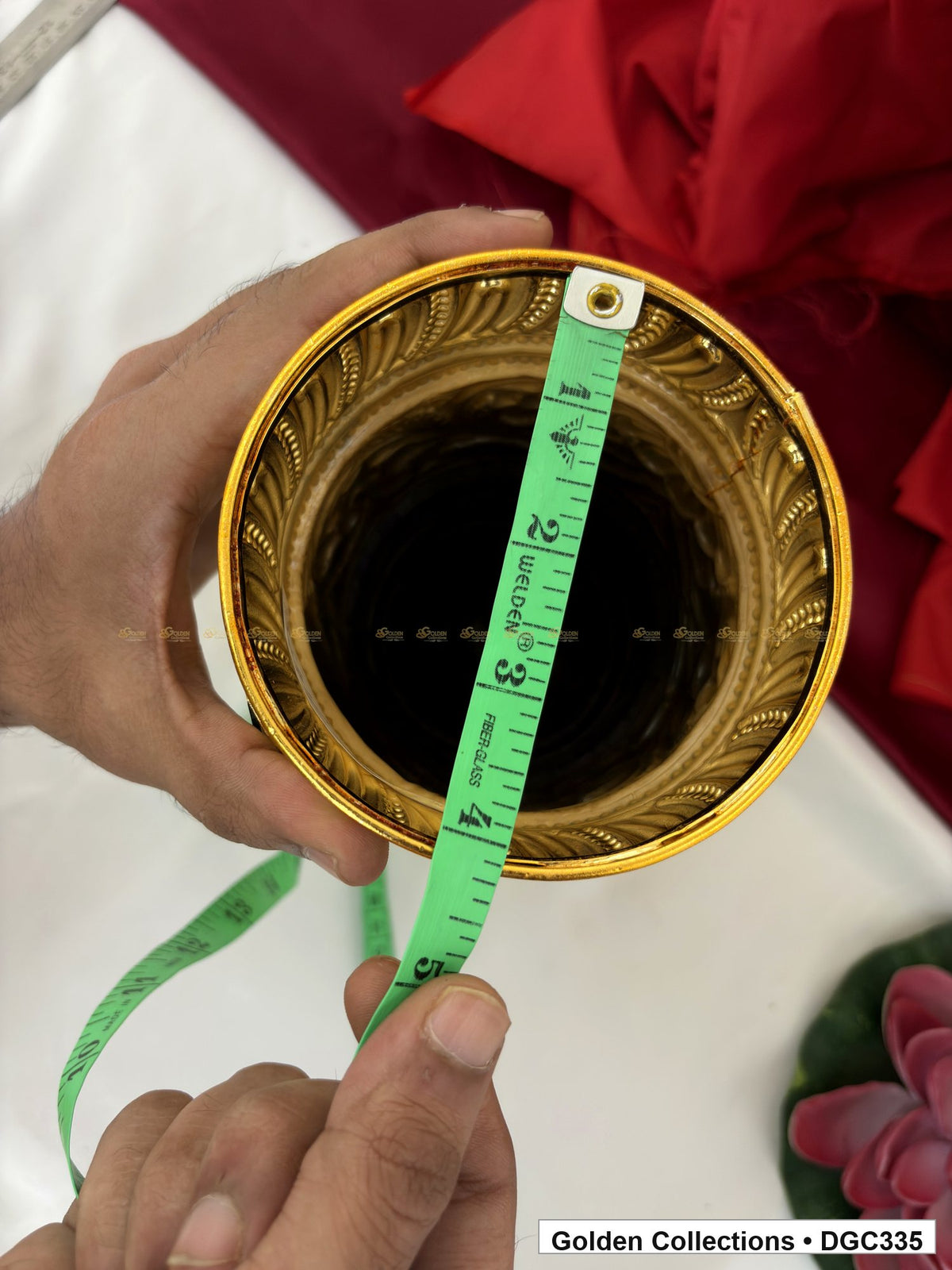 Opening measurement view of scroll medallion full-round brass deity crown with red green accents, measured size 9.5 X 13.5 X 4