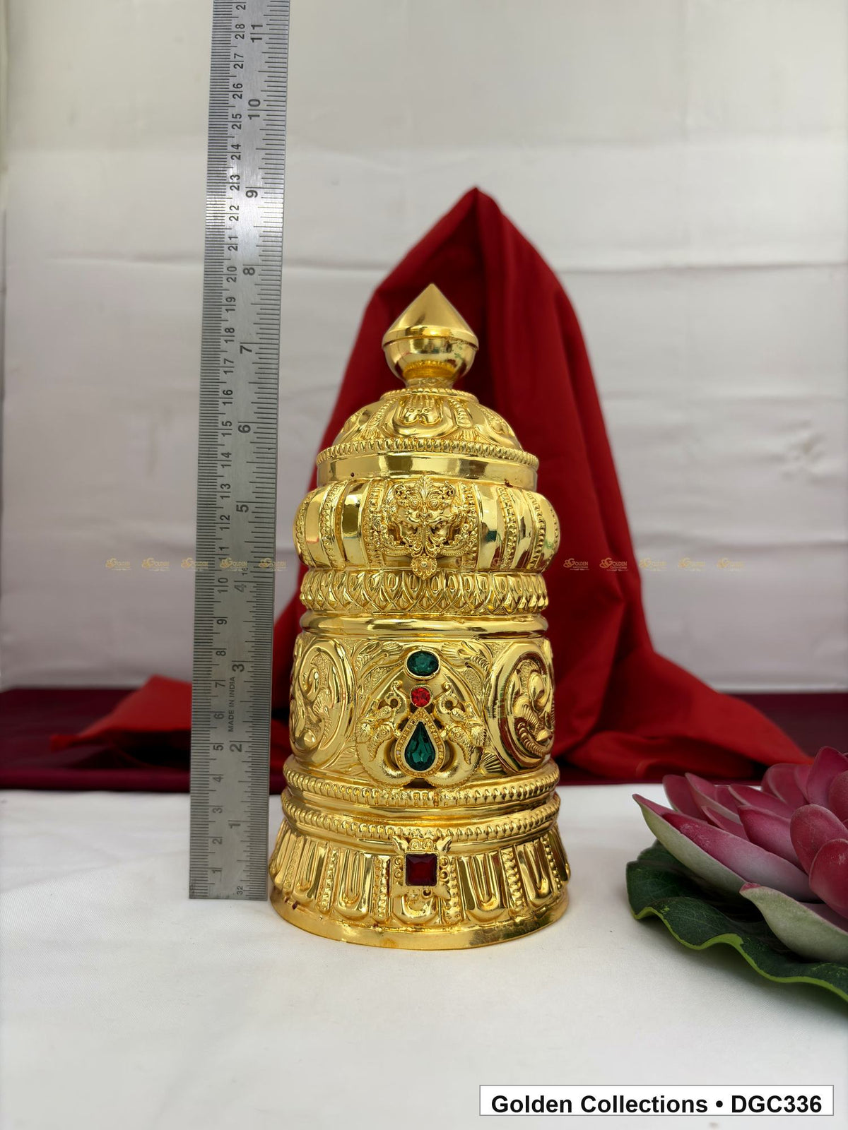Height measurement view of scroll medallion full-round brass deity crown with red green accents, measured size 8.7 X 12 X 3.7