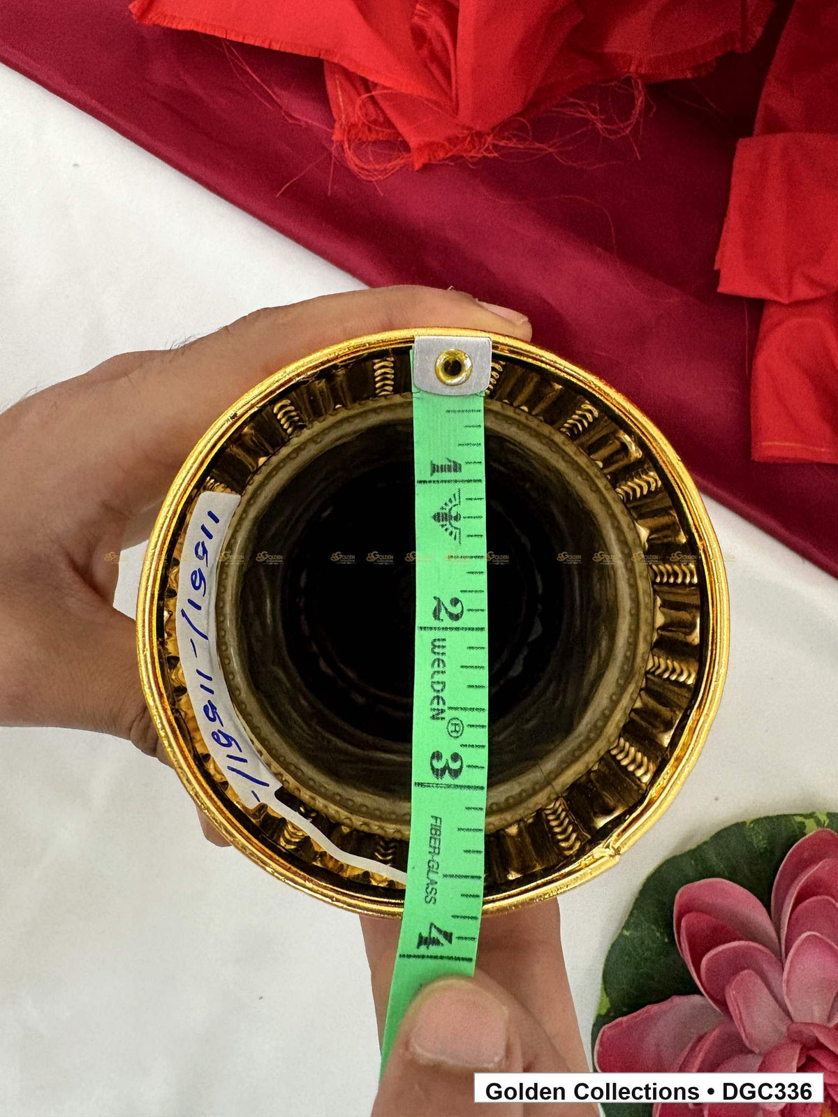 Side and base measurement view of scroll medallion full-round brass deity crown with red green accents, measured size 8.7 X 12 X 3.7