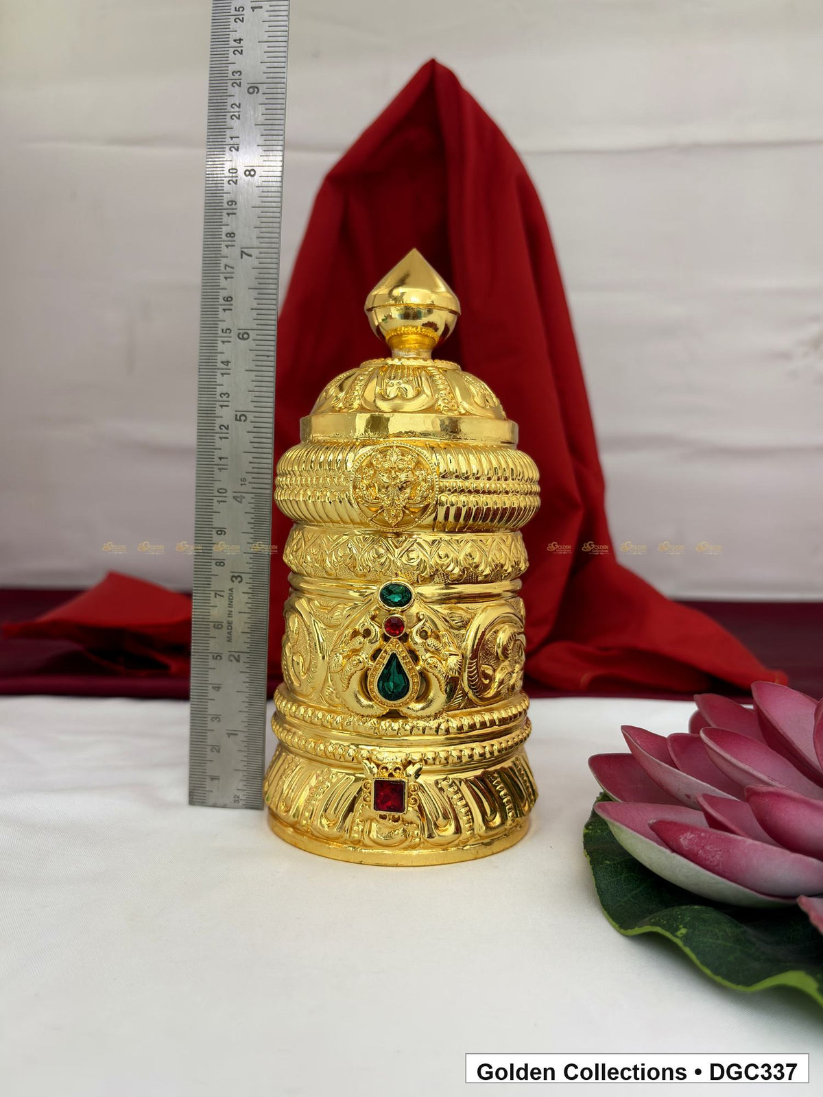 Height measurement view of scroll medallion full-round brass deity crown with red green accents, measured size 7.5 X 10.5 X 3
