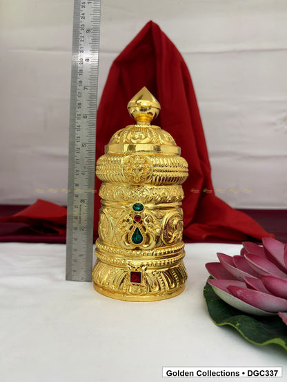 Height measurement view of scroll medallion full-round brass deity crown with red green accents, measured size 7.5 X 10.5 X 3