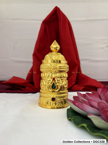Front view of scroll medallion full-round brass deity crown with red green accents, measured size 6.2 X 9 X 2.7