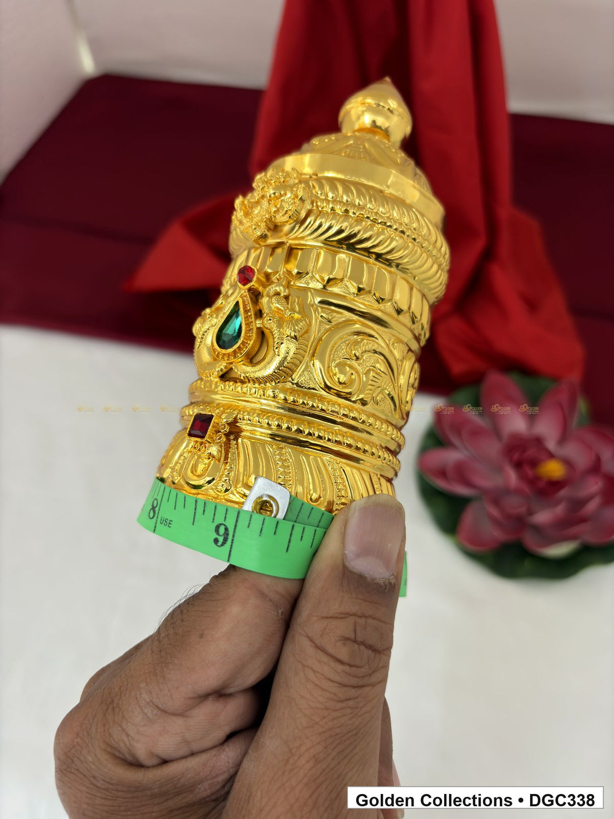 Side and base measurement view of scroll medallion full-round brass deity crown with red green accents, measured size 6.2 X 9 X 2.7