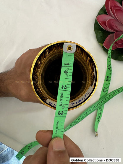 Opening measurement view of scroll medallion full-round brass deity crown with red green accents, measured size 6.2 X 9 X 2.7