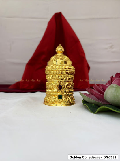 Front view of scroll medallion full-round brass deity crown with red green accents, measured size 4.7 X 7.5 X 2.25