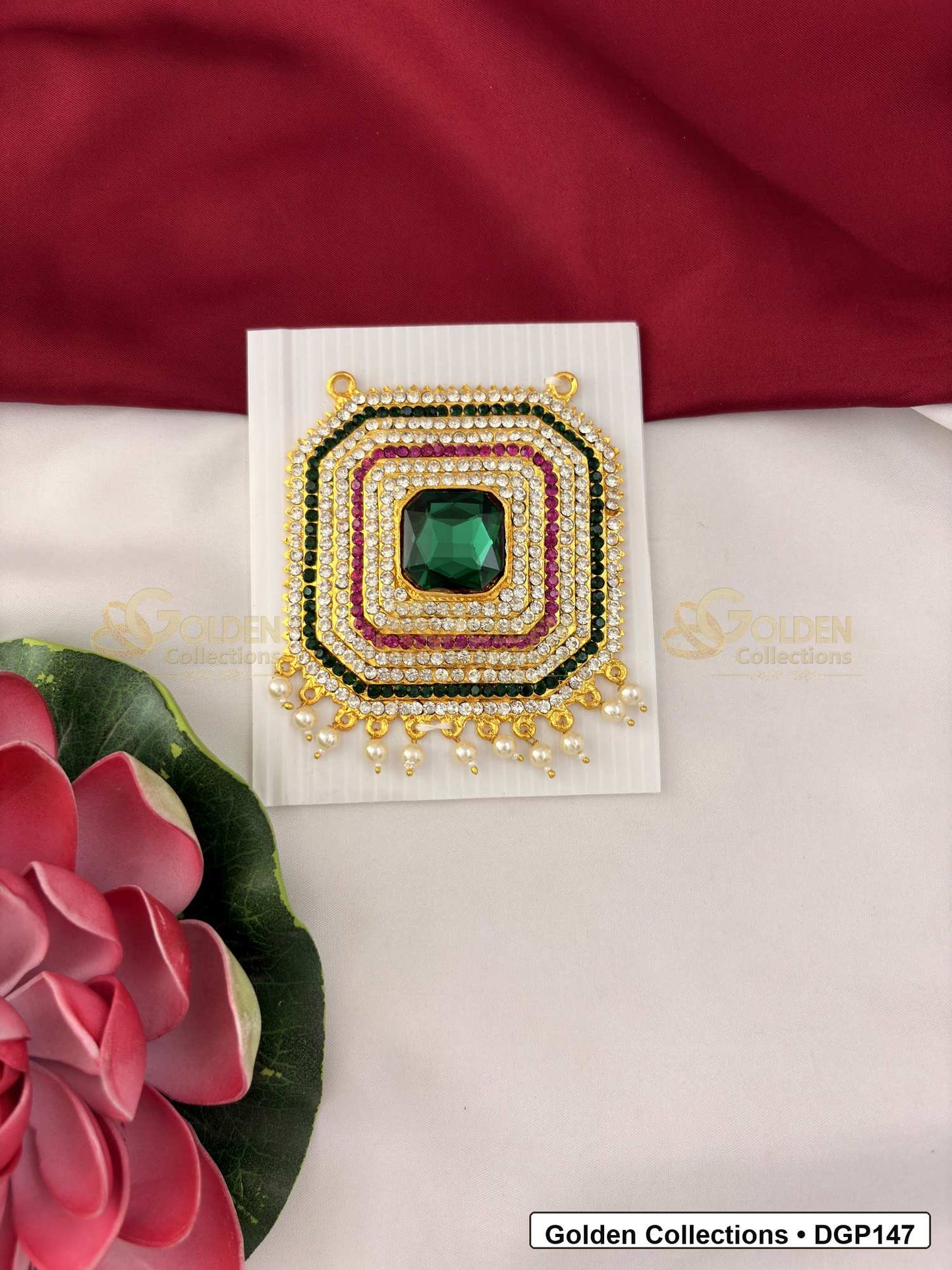 Square Green Stone Deity Pendant for Idol Alankaram front view showing square deity pendant with central green stone, red and clear stone borders and gold-tone setting for idol alankaram