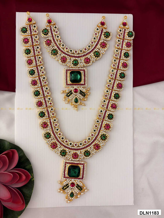 Front view of deity long haram set with multicolor stones and gold plating for idol alankaram