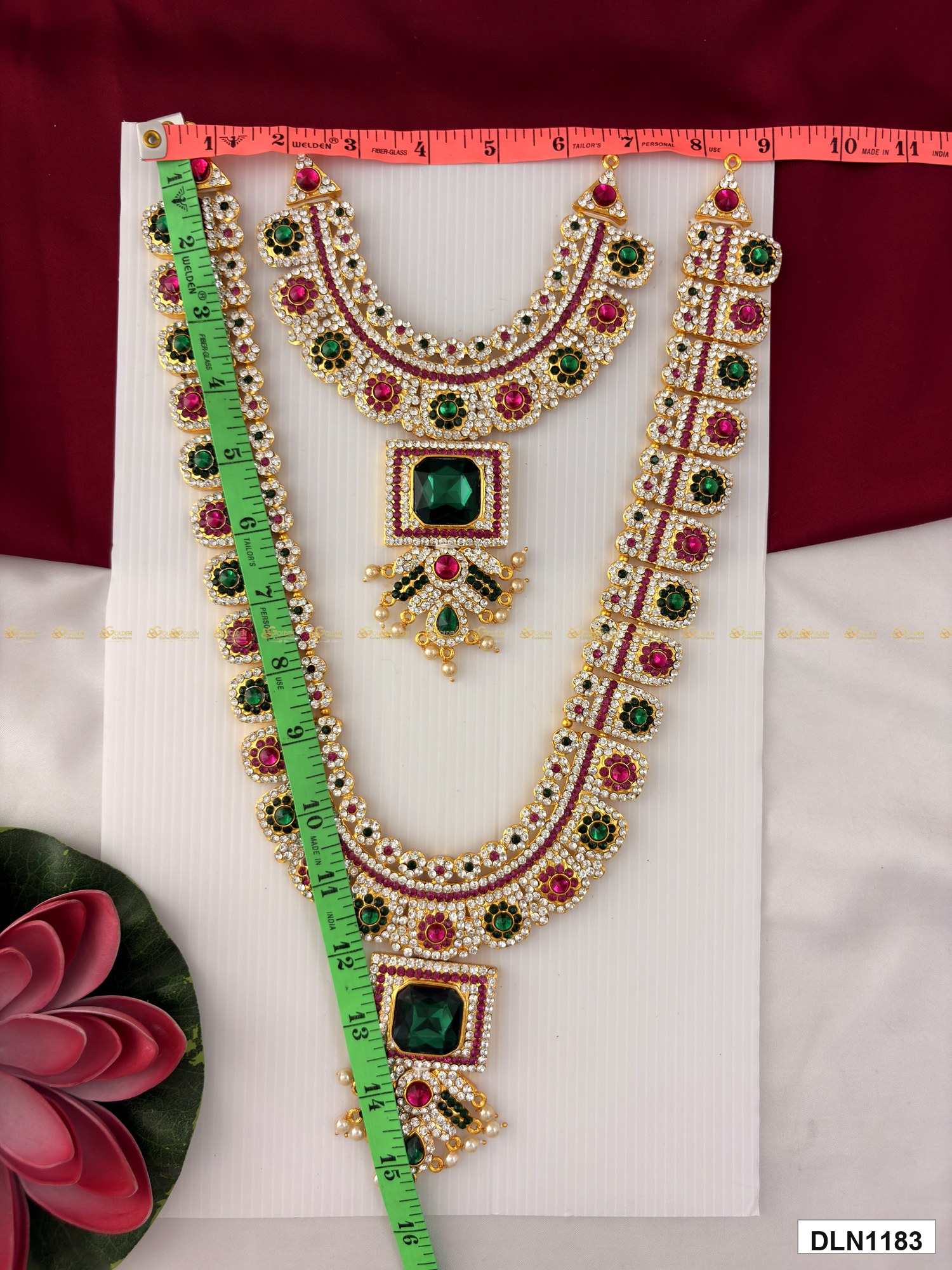 Measurement photo of deity long haram set with measuring tape for idol alankaram size reference