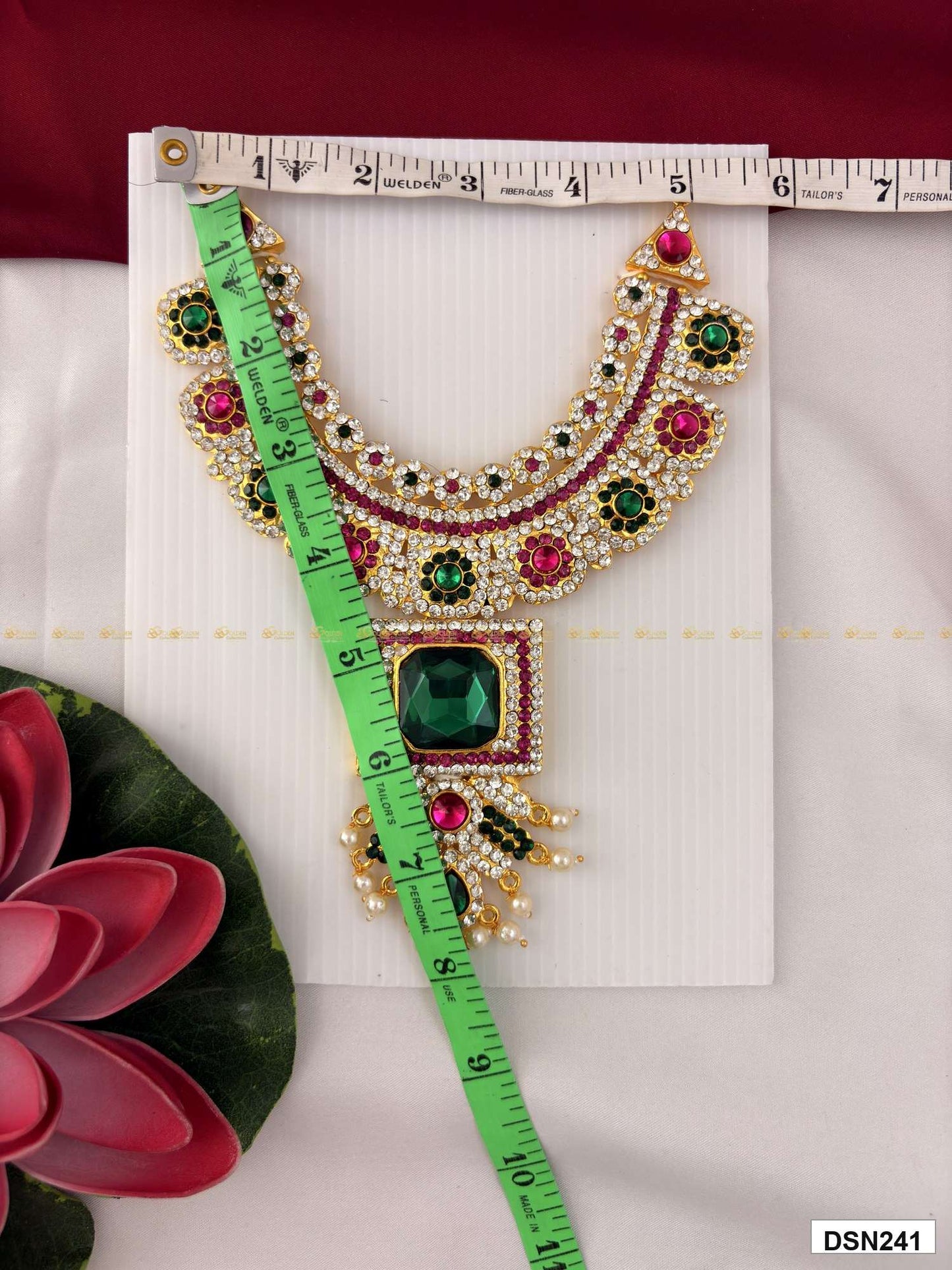 Measurement photo of deity short haram with measuring tape for idol alankaram size reference