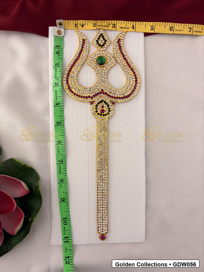 Measurement photo showing 11 x 4 Inches stone work trishul for idol alankaram with measuring tape for idol alankaram
