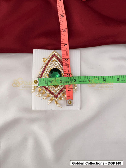 Measurement photo showing 3.5 x 3 Inches teardrop green stone deity pendant for idol alankaram with ruler for idol alankaram