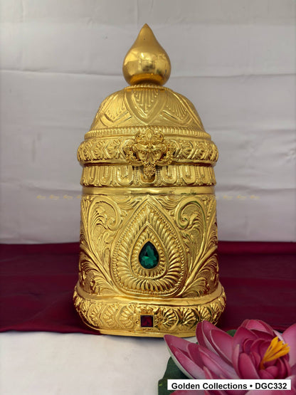 Front view of teardrop medallion full-round brass deity crown with red green accents, measured size 15 X 23 X 7