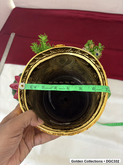 Opening measurement view of teardrop medallion full-round brass deity crown with red green accents, measured size 15 X 23 X 7