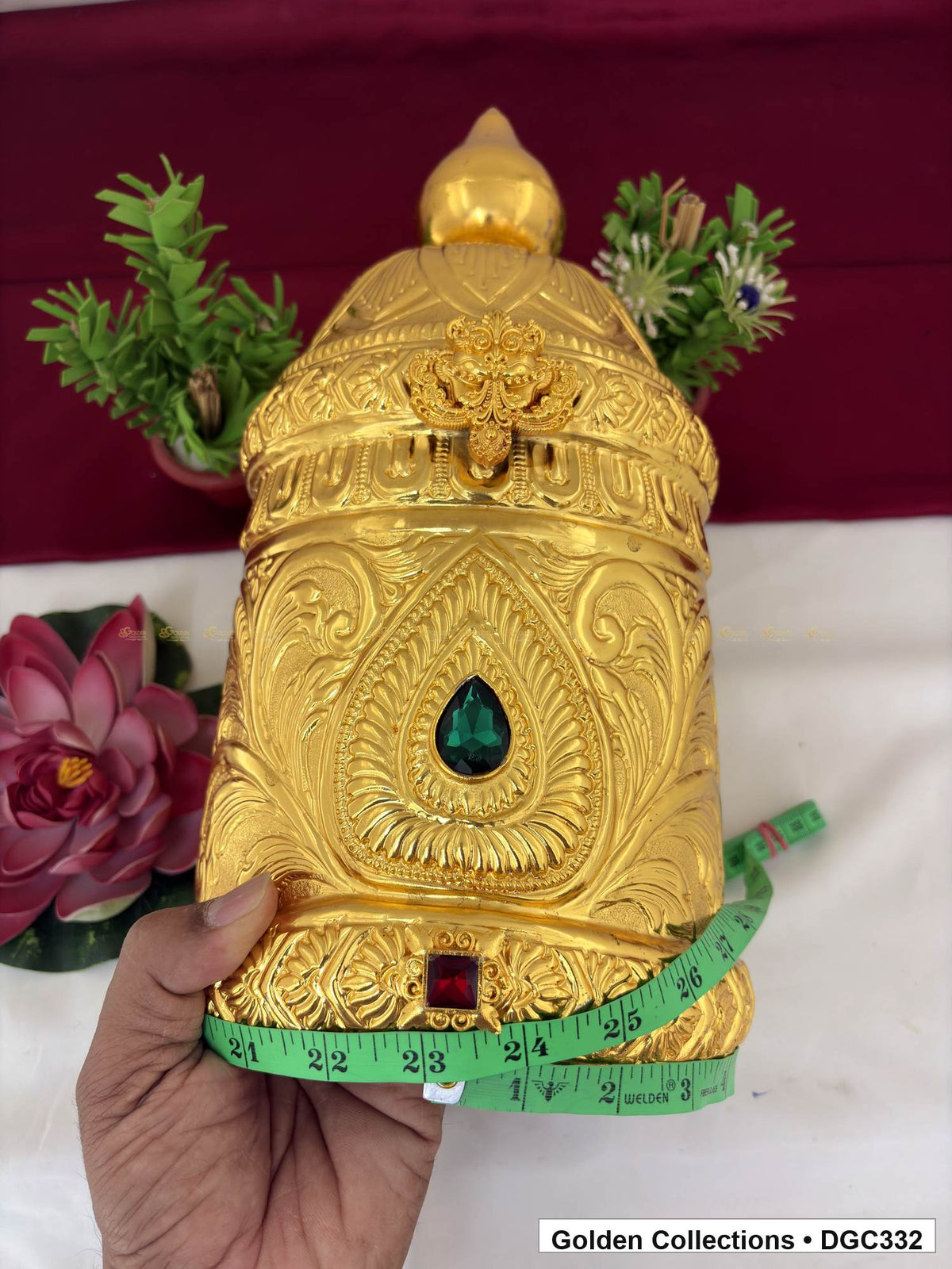 Side and base measurement view of teardrop medallion full-round brass deity crown with red green accents, measured size 15 X 23 X 7